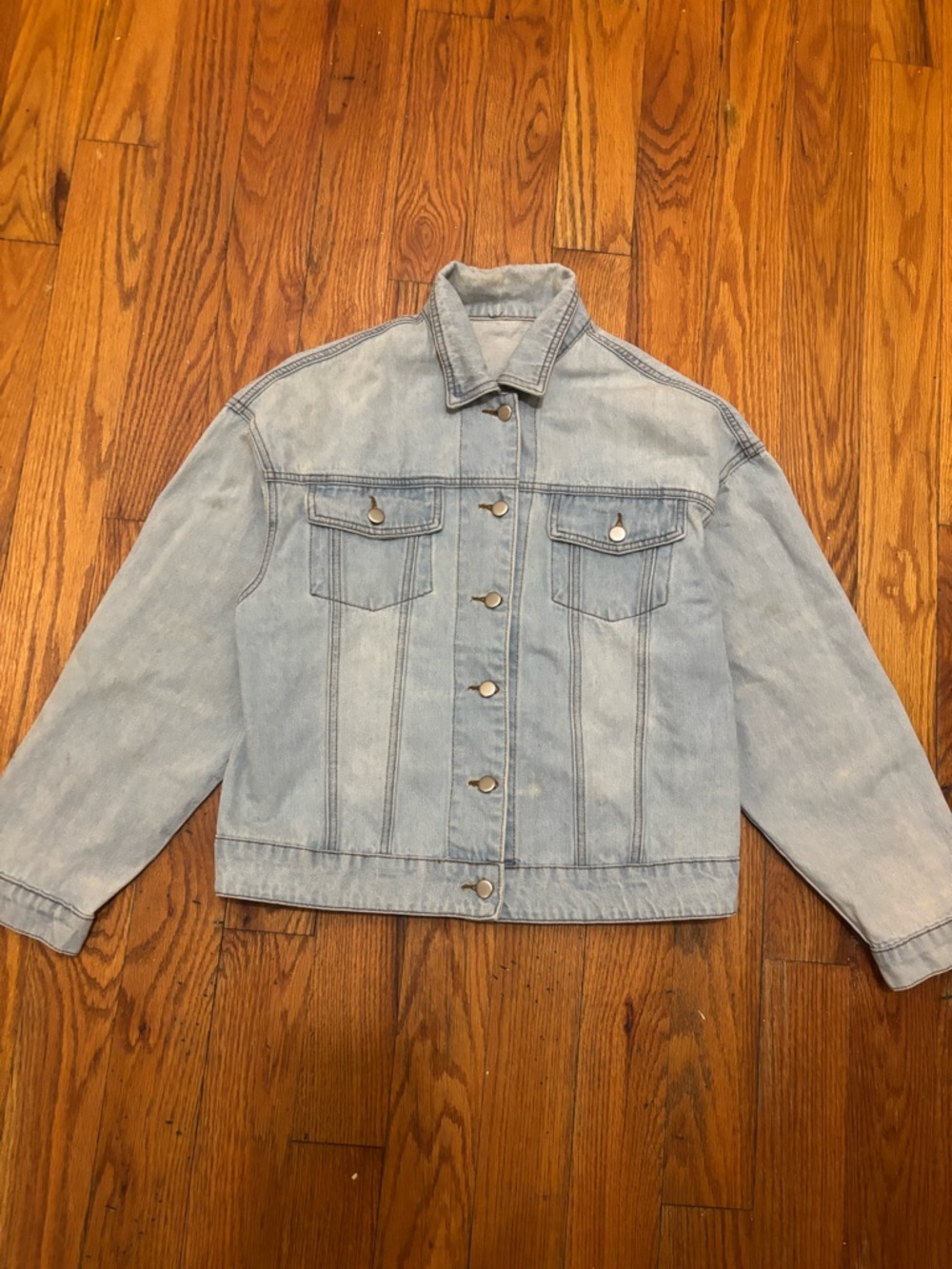 Light blue denim jacket with lace-up details #denimjacket #laceup